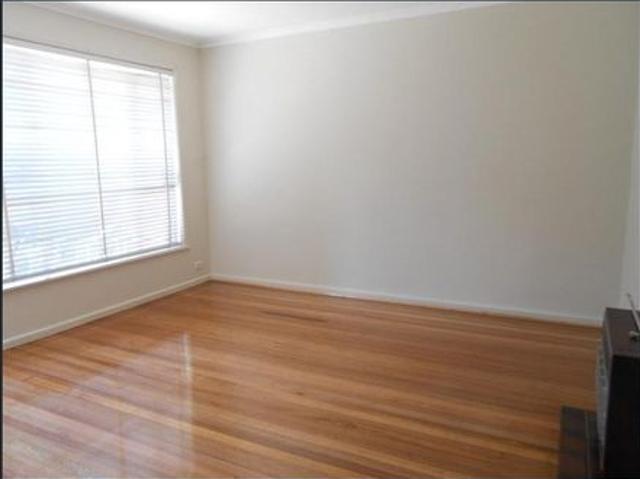 Updated One Bedroom Villa Unit with Private Courtyard in Prime Coburg Location