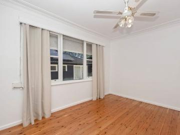 UPDATED AIR CONDITIONED FAMILY HOME WITH BONUS DOWNSTAIRS FLEX ZONE