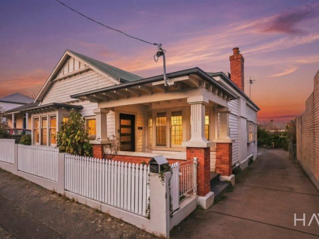 Updated Character Living with Side Access, Double Car Garage & Conveniences