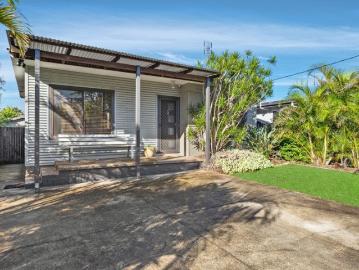 Updated Cottage Home with Rear Lane Access