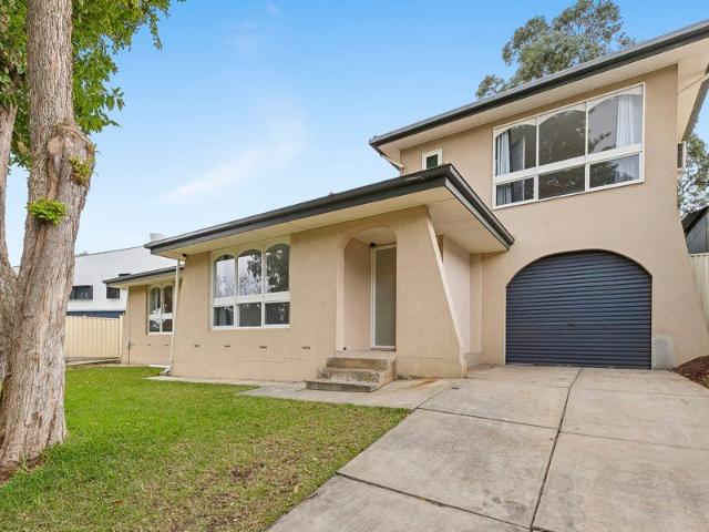 Updated Four Bedroom Home with Flexible Family Living