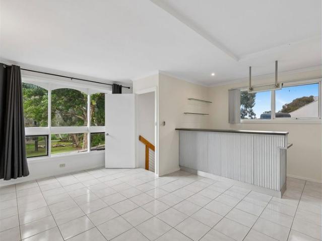 Updated Four Bedroom Home with Flexible Family Living