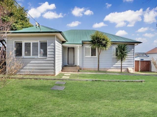 Updated Four Bedroom Home with Spacious Yard