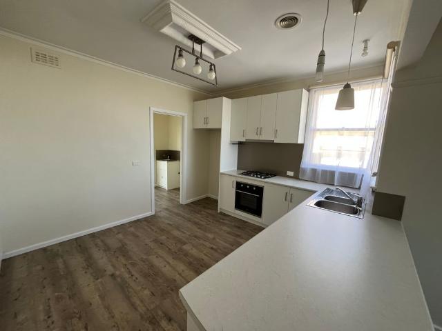 Updated Home with Ensuite in Great Locale