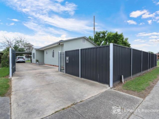 UPDATED LIVING WITH DEVELOPMENT POTENTIAL