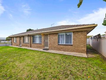 Updated & Low Maintenance Living in a Convenient Location
