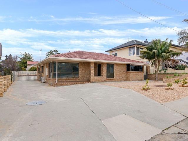 Updated, low maintenance living with great car space