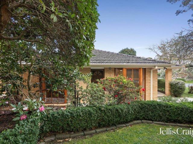 Updated single level brick veneer home with spacious secure backyard
