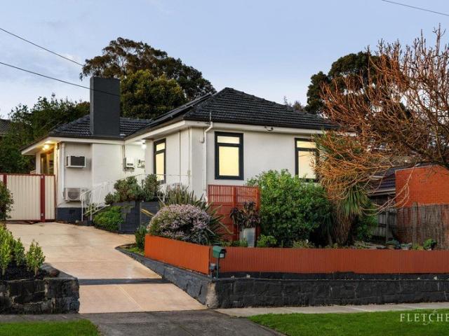 Updated Single Level Living Set Within Established Gardens