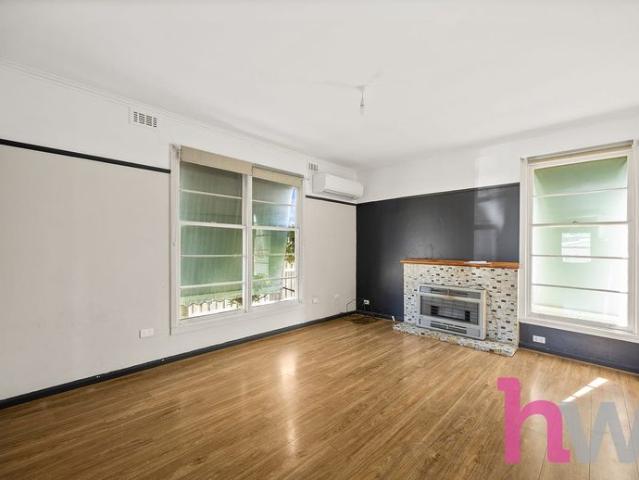 Updated Two Bedroom Home with Generous Backyard