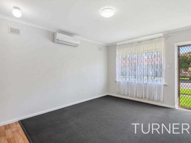 Updated Two Bedroom Unit between the City and the Sea. Air Conditioning & near new Kitchen