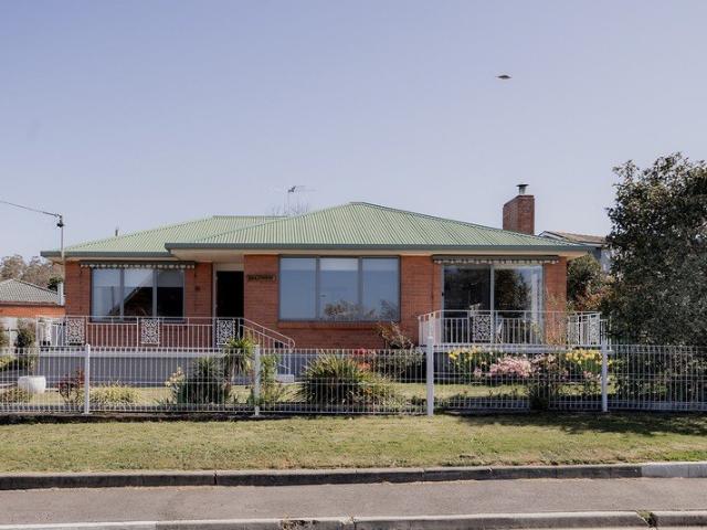 Updated throughout, light filled living spaces, undercover alfresco area and generous side access
