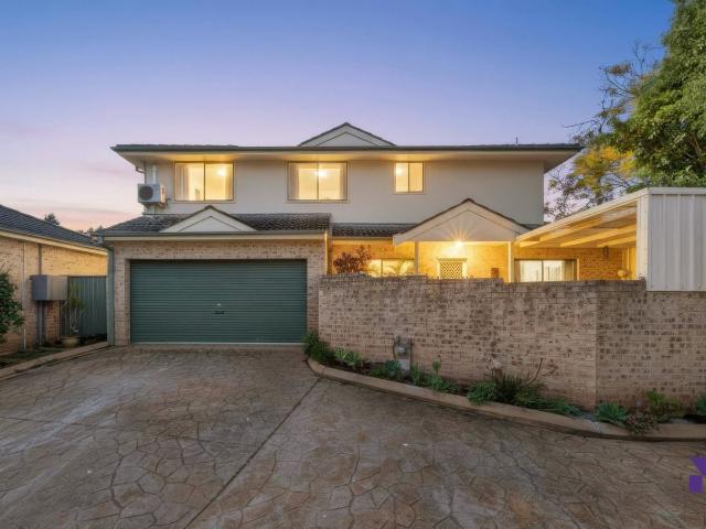 Updated Three Bedroom Townhouse with Multiple Outdoor Areas!