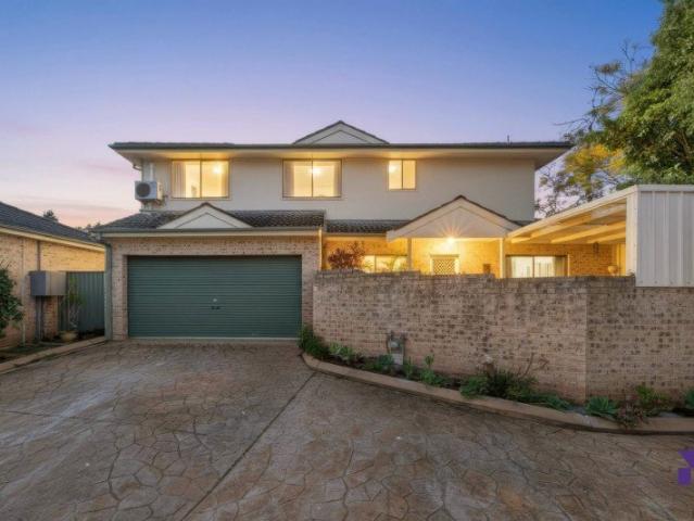 Updated Three Bedroom Townhouse with Multiple Outdoor Areas!