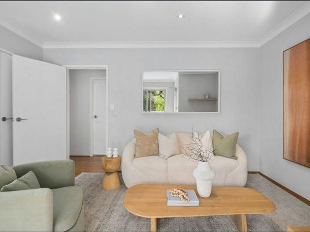 Updated Top Floor Apartment with Two Balconies in a Prime Maroubra Location