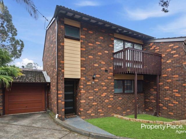 Updated Townhouse with Low Maintenance Lifestyle