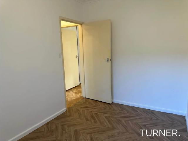 Updated Unit Offering Comfortable, Low Maintenance Living