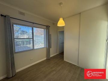 UPDATED UNIT PERFECT LOCATION