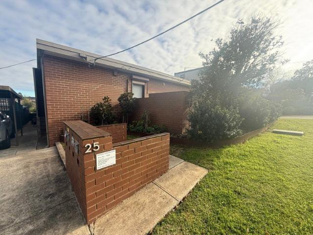 UPDATED UNIT WITH LARGE COURTYARD!