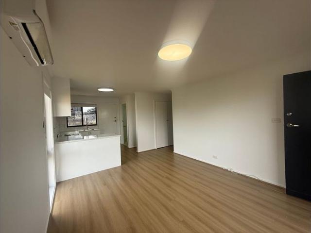 UPDATED UNIT WITH LARGE COURTYARD!