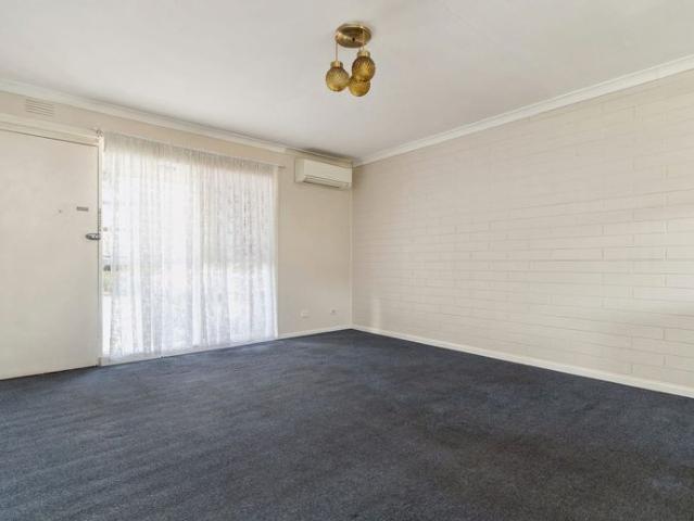 Updated 2 Bdrm ~ 1 Bath Back of the Block with SHED and Assigned Carport