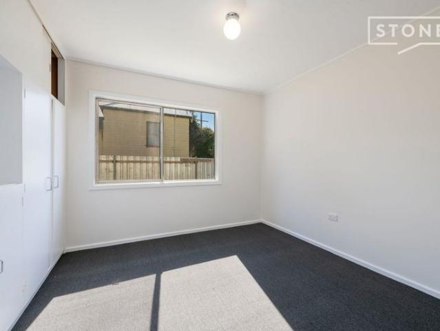 Updated 2 Bedroom Unit – Water & Lawn Maintenance Included