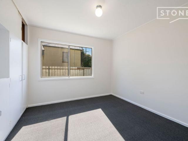 Updated 2 Bedroom Unit – Water & Lawn Maintenance Included