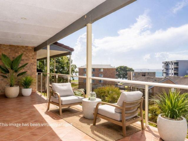 Updated 2 Bedroom unit with filtered views of the water in Little Beach Nelson Bay