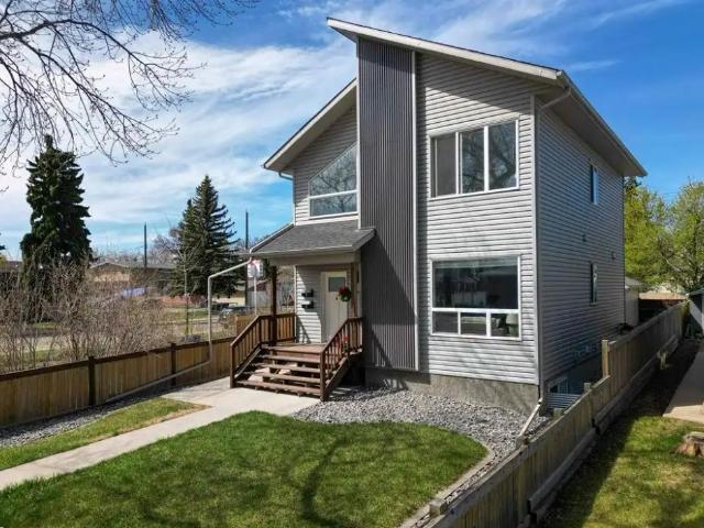 Updated 2 storey main floor home with Double Detached Garage