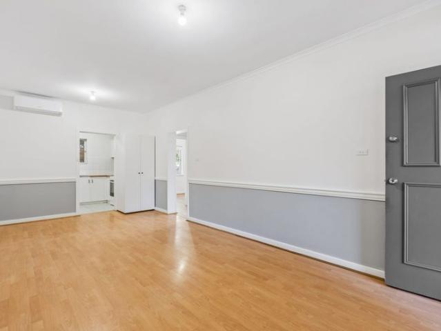 Upgraded Lower Level 2 Bedroom Unit. Private Front and Rear Courtyards