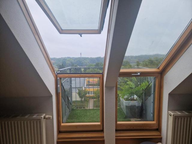 Upscale Attic Apartment with Stunning City Views