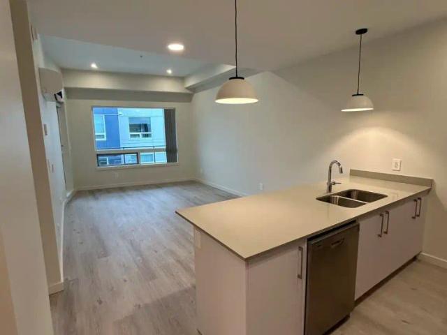 Uptown Residences Building A — 1BR + DEN