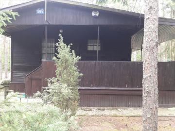 Urokliwa działka z drewnianym domem 31,24 m2 w Ołdakowiznie