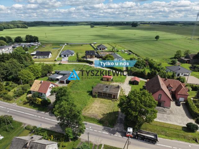 Urokliwa działka 2525 m² z budynkami w Piaszczynie