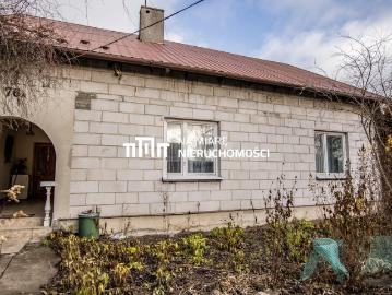 Urokliwy dom 80 m² z budynkiem gospodarczym i prywatną działką