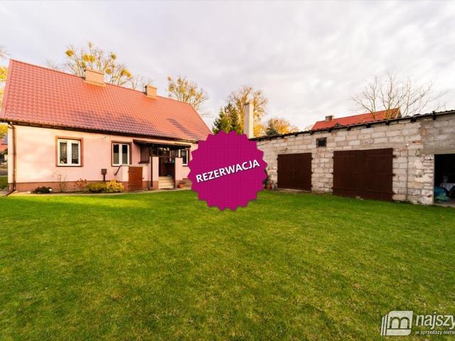 Urokliwy dom 90 m2 z garażem i dużą działką