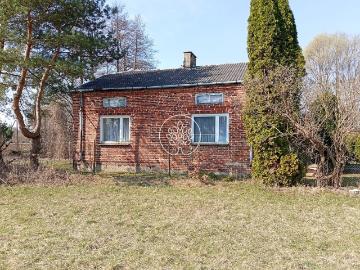 Urokliwy dom z cegły 82 m² na dużej działce z potencjałem