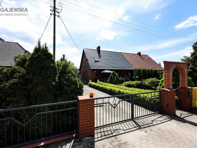 Urokliwy dom z cegły, 96 m2, ogród, garaż, inwestycja