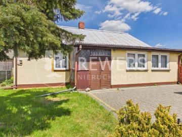 Urokliwy dom z dużą działką i klimatem, 79 m²