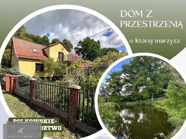 Urokliwy dom z dużą działką, stawem i budynkami gospodarczo