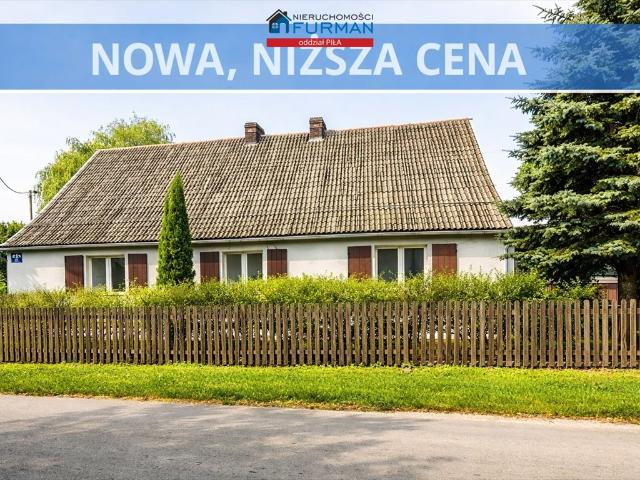 Urokliwy dom z historią na malowniczej działce