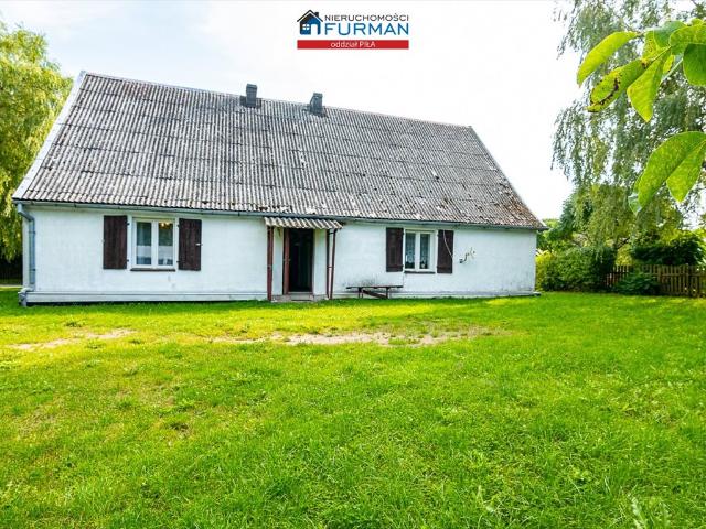 Urokliwy dom z historią na działce 1316 m² w Lipiu
