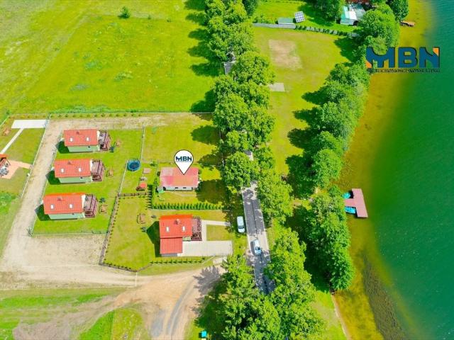 Do sprzedania urokliwy domek nad jeziorem z dużym tarasem