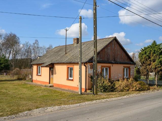 Urokliwy drewniany dom 70 m² z dużą działką w Nowych Iganiach