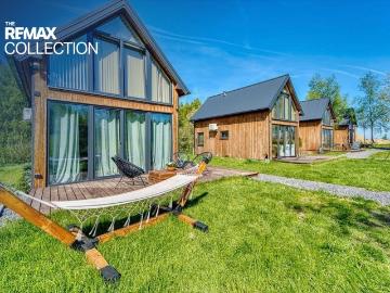 Urokliwy pensjonat z 4 domkami, wellness i własną wodą