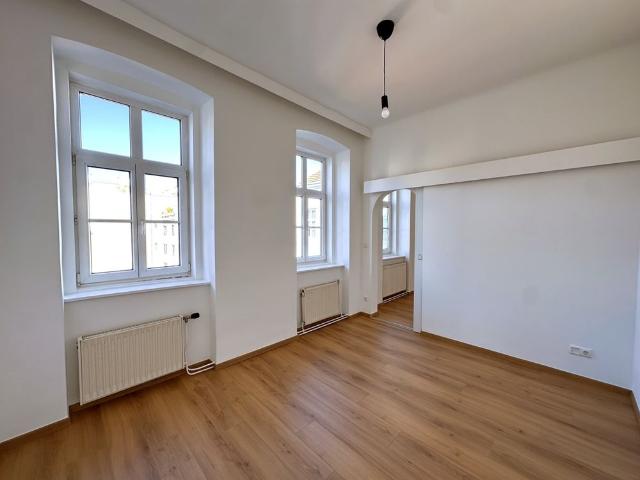 Urban wohnen im grünen Innenhof