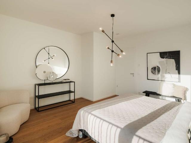 Urbanes Wohnen neu gedacht: 3 Zimmer Penthouse mit Loggia und teilweise überdachter Dachterrasse
