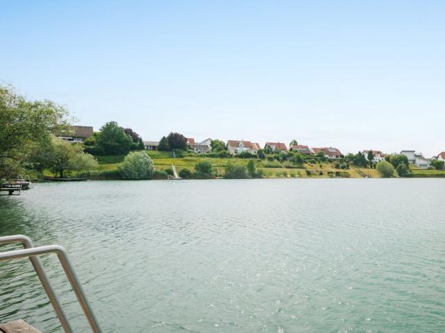 Urlaubsfeeling Inklusive! Modernes Einfamilienhaus mit Balkon, Terrasse und Garten in Gated Community mit Idyllischem Badesee