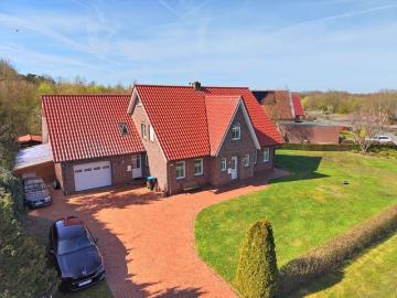 Urlaubsfeeling inklusive: Wohnhaus mit Einbauküche, Garten & Garage am Großsander Badesee
