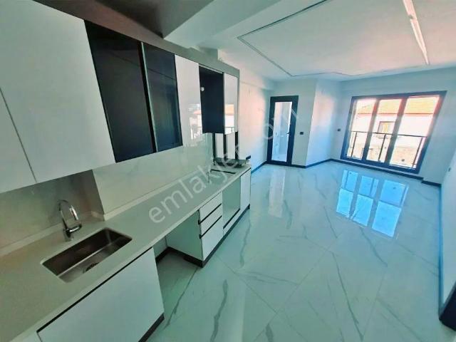Uytundan Zeytinli Köy Merkezinde Yerden Isıtmalı Sıfır 1+1 Daire
